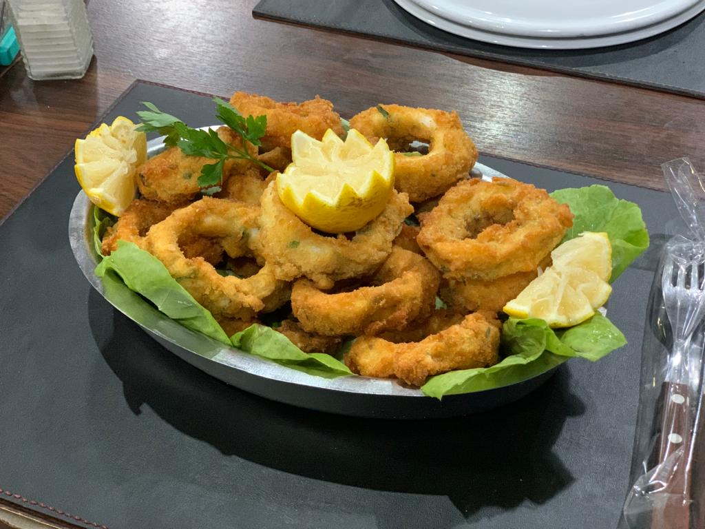 Interior parrilla La Nueva Adelina Villa Adelina - Ambiente cálido